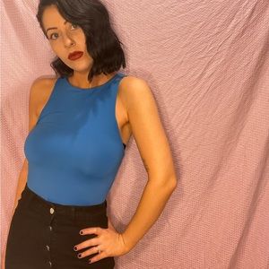 Cobalt blue halter bodysuit. Stretchy, flattering fabric. My stats: 5’6 32-25-36
